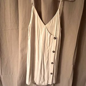 Beige/Cream Mini dress with brown button detail. Size: Large NEVER WORN. NEW.